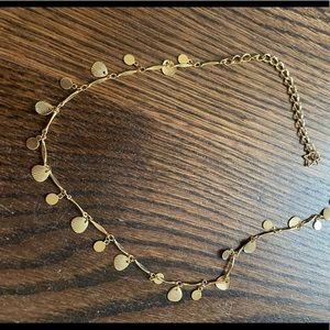 Gold seashell necklace